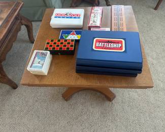 One of two side tables with games