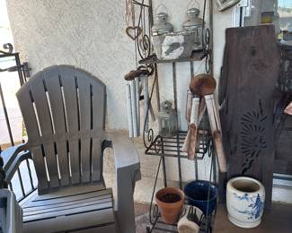 Tall, iron plant pear, weather resistant, Adirondac sort of style chairs,  Wind chimes