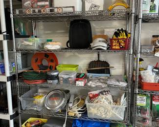 Tarps, GMC hubcaps, extension cords felt pads for all sizes of furniture and decor, knee pads, Electric impact wrench, cooler,  level