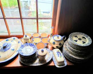 Several dinnerware sets