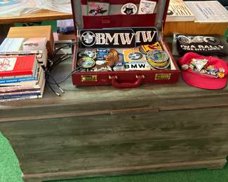 Collection of BMW patches and owners manuals