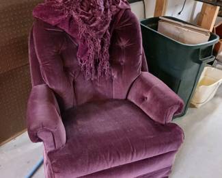 Burgundy upholstered tufted chair
