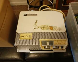 Vintage wool and Sack reel-to-reel player with many tape reels