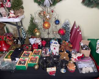 Large collection of holiday decor, ornaments, trimmings, wreaths, and more
