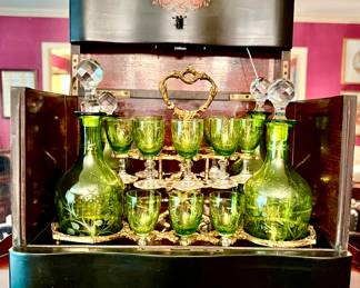 ANTIQUE GREEN CRYSTAL TANTALUS LIQUOR CADDY.