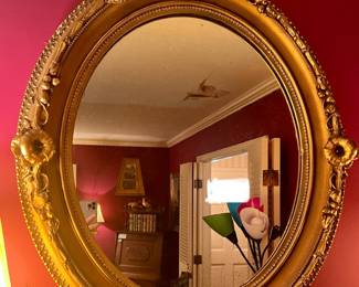 PAIR OF ANTIQUE OVAL "MORNING GLORY" MIRRORS.
