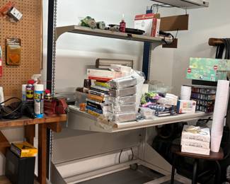 Industrial Work Station $500. Entire desk is wired for electricity. Attached light works.