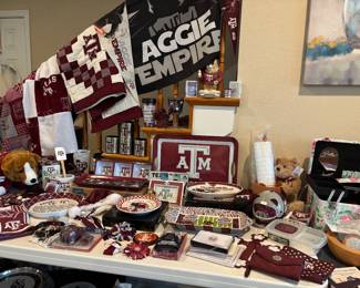 Texas A&M Clothing--including new $6 and used $4 T-Shirts, Golf Shirts $10, Hoodie $10, 2 Jerseys--#12 and Johnny Manziel Cleveland Browns Jersey. Decor items galore, lap blankets, Aggie Flags