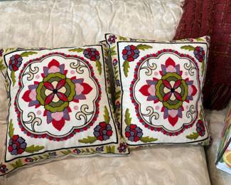 Many throw pillows