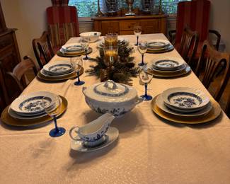 Complete service for 8 with a trio of serving platters, Tureen, gravy boat and bowls.