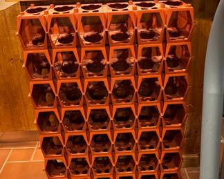 Orange plastic modular wine rack by uniflex