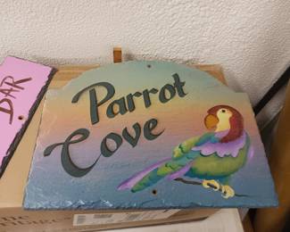 Several painted signs to hang around your man cave or Tiki Bar