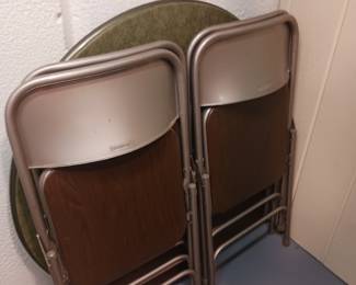 Folding chairs and round card table