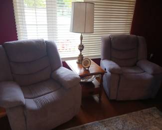 Pair of upholstered oversized reclining chairs