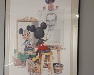 Mickey Mouse draws a portrait of Walt Disney