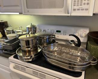 lots of kitchen pots and pans