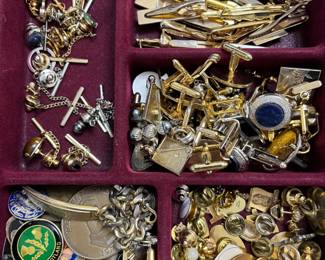 lots of costume jewelry, clip and pierced earrings, necklaces, bracelets, bangles, men's tie clips and cufflinks, etc.