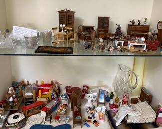 lots of dollhouse furniture and accessories