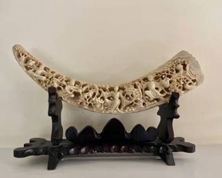 carved horn on stand