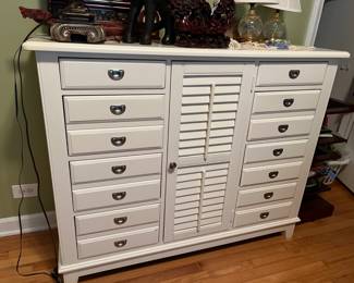 really nice white dresser with shutter detailed center cabinet and 2 felt lined jewelry drawers