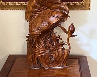 Carved wood fish sculpture