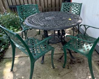 cast metal patio chairs and table