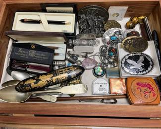 belt buckles, pens, antique spoons, etc