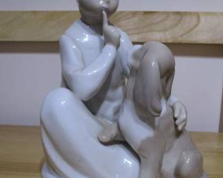 Lladro "Boy with Dog" Figurine