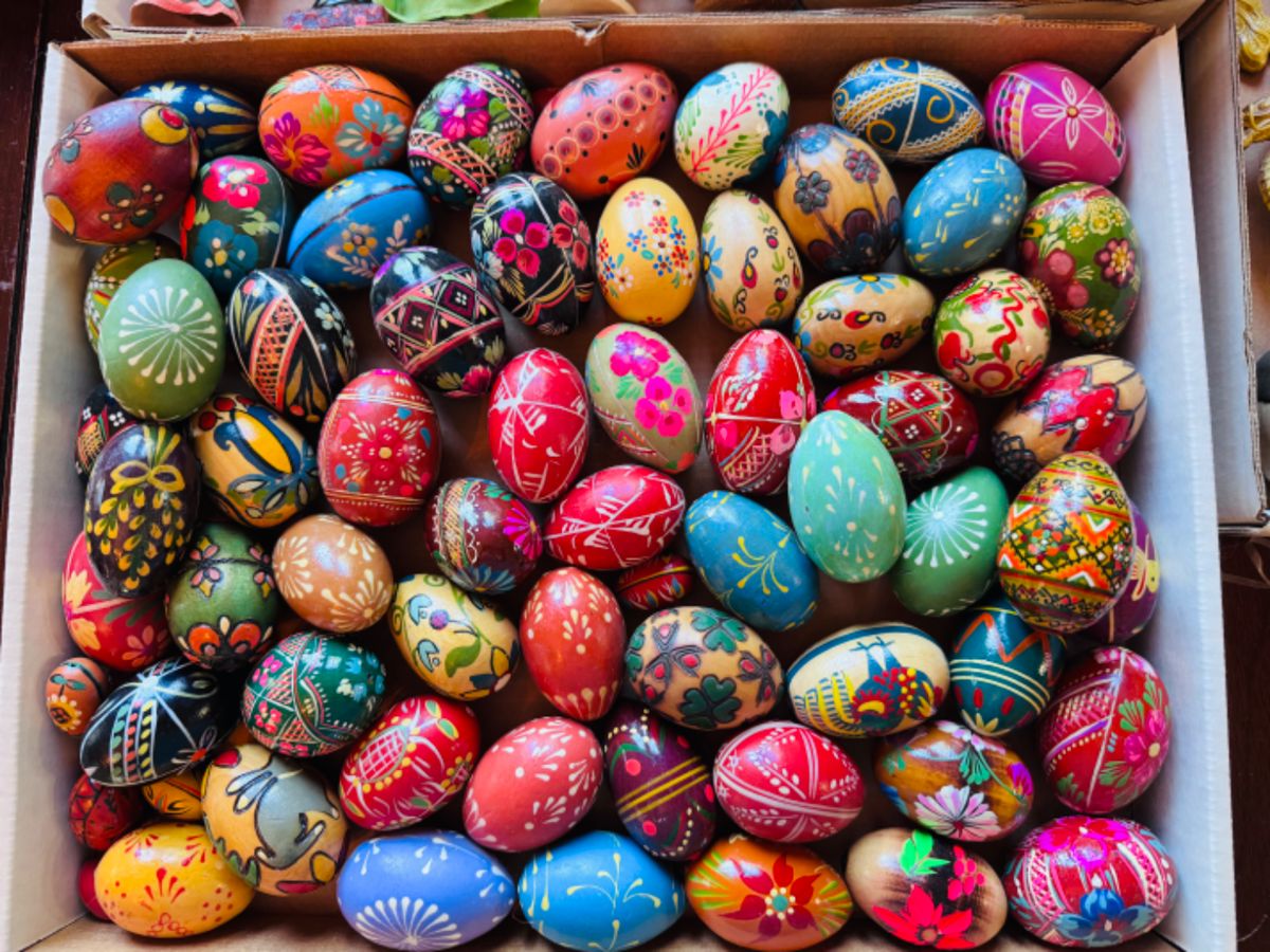 Collection of handprinted wooden eggs