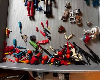 Variety of accessories for Micronauts and other vintage toys