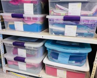 Lots of fabric including heavy twill, denim, synthetics, wool suiting, cotton velveteen, knits, woven cotton... storage containers for sale as well!