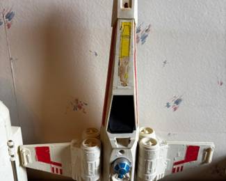Star Wars X-Wing fighter. Some if not all accessories  on site.