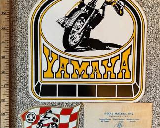 Vintage Yamaha decals. Bid online at: https://modestlambestatesales.hibid.com/