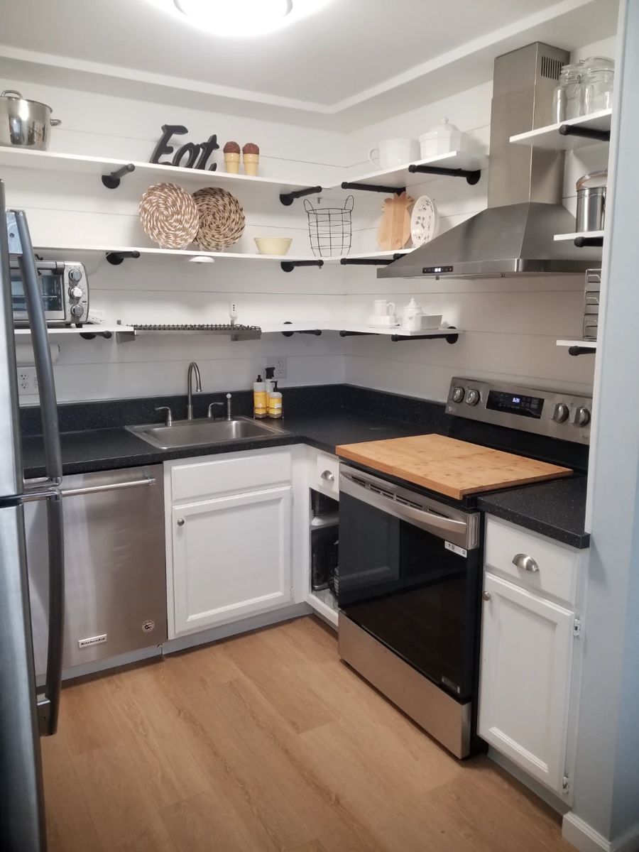 Completely updated kitchen with clean & contemporary base cabinets and floating shelves