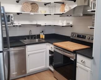 Completely updated kitchen with clean & contemporary base cabinets and floating shelves