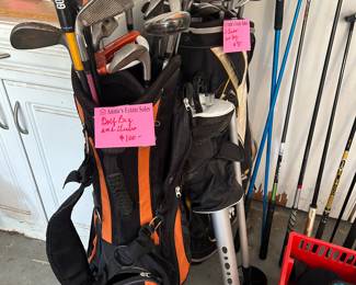 Golf clubs, including tailor-made, set of irons and woods left-handed.