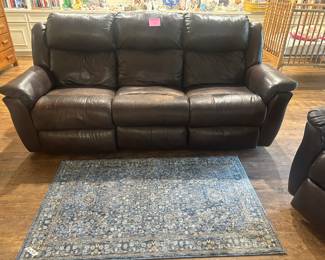 Leather reclining sofa