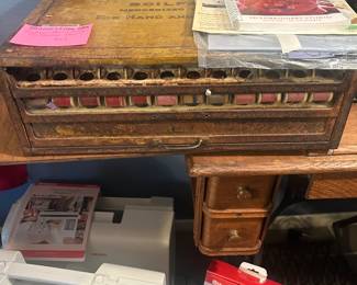 Antique spool cabinet