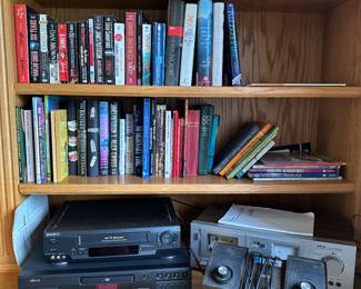 Books, Atari Pong Game, Akai Tape Player, Sony VHS and Denon DVD Player