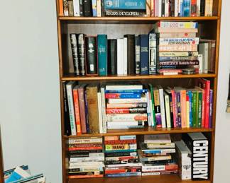 Solid wood bookcase filled with old to new, fiction and non-fiction books + a selection of coffee table and children's books