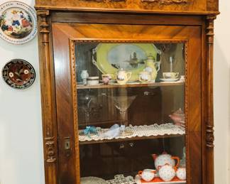 Carved wood antique display cabinet