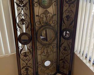 Three Long Metal Art Pieces With Mirrors Placed On Them