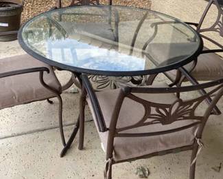 Round Glass Metal Table With Four Matching Chairs