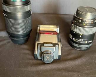 Three Nikon Camera Lenses