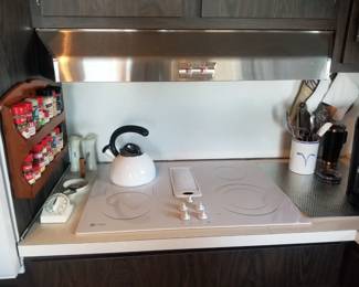 GE cooktop; stainless steel range hood