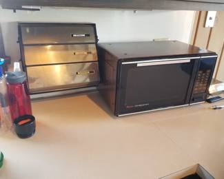 Microwave oven; foil dispenser