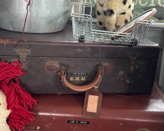 vintage luggage and plush toys 