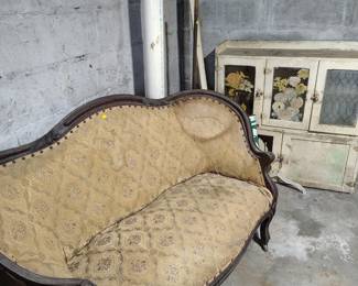 antique camel back loveseat 