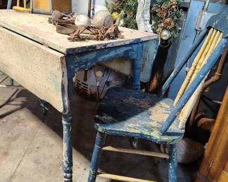 drop leaf table and two chairs 