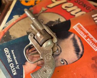 cap guns, sheet music 